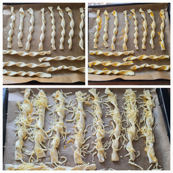 einfache Blätterteig-Käsestangen mit Kräuterbutter zubereitet und vor dem Backen.